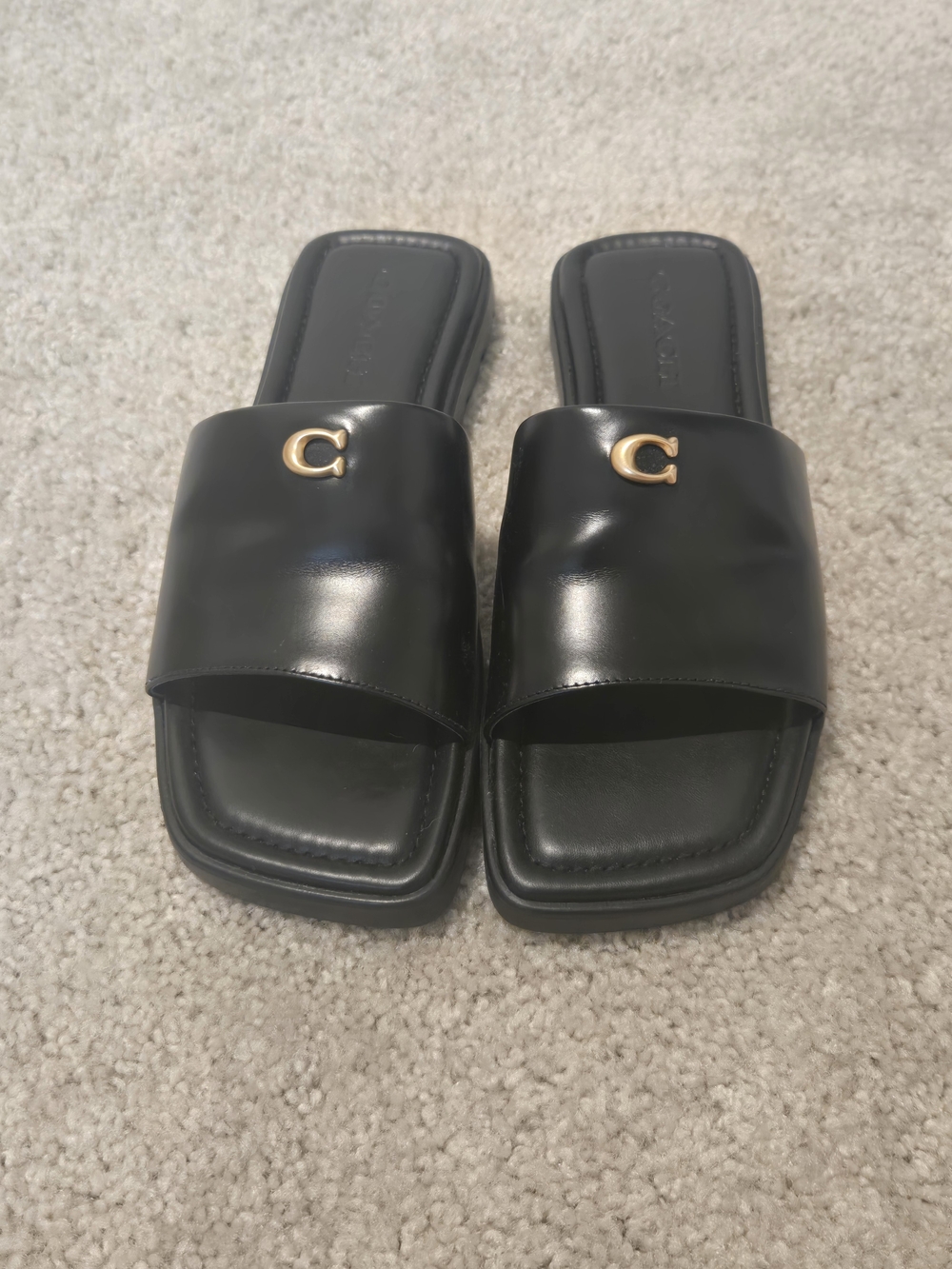 Coach Black Leather Slide Sandals with Gold 'C' Accent